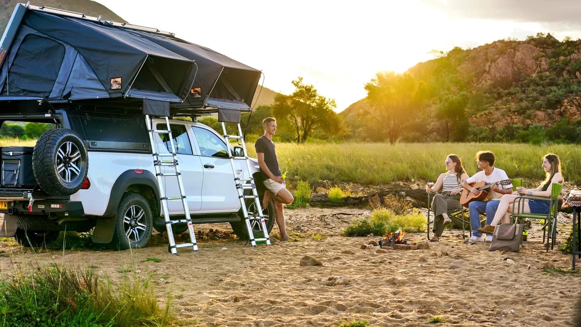 Camping 4x4 vehicle with roof top tent
