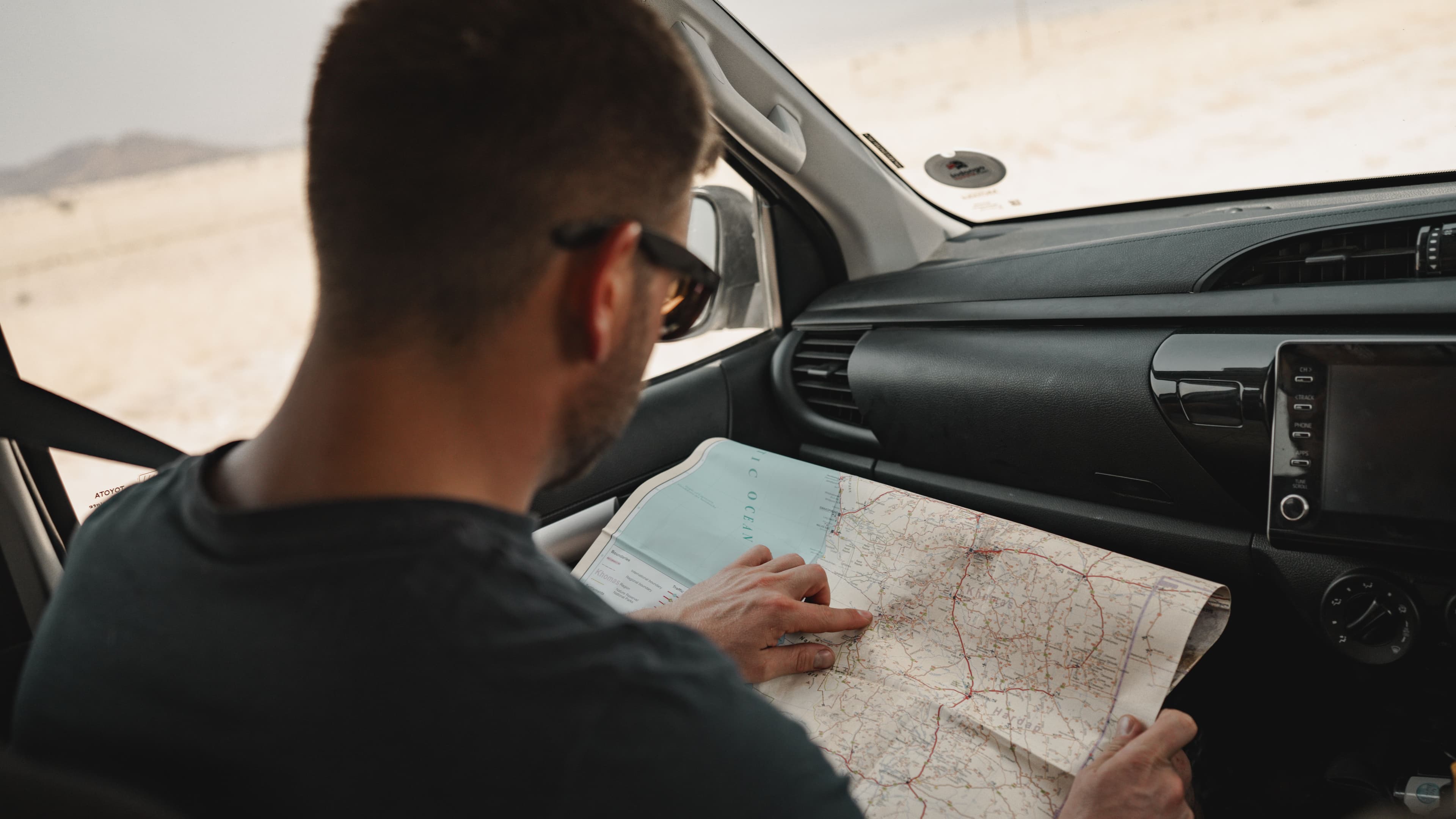 Passenger looking at the map of Namibia